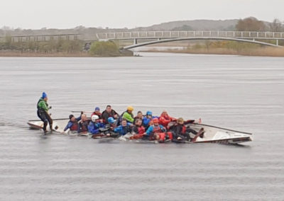 Controlled capsize commences, members enter cold water in April